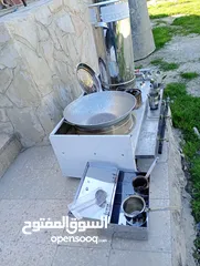  1 عدة قهوه غاز ثلاث عيون سخان ماء صينيه معالق ومعلقة عيار وحافضه