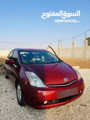  1 برويس 2006 احمر مرخصة لغاية28/1/2026 السيارة جيدة جدا
