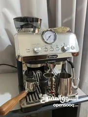  1 مكينة صنع القهوة delonghi