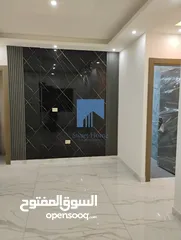  5 شقة أرضية فاخرة للبيع في الجاردنز  - خلف الدستور 155م مع ترس 25م تشطيب سوبر ديلوكس لم تسكن