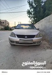  1 لانسر موديل 2005 قير عادي متور 1300