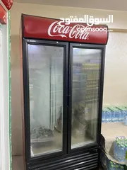  1 ثلاجة كولا بابين