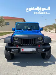  1 JEEP WRANGLER SAHARA