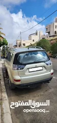  2 ميتسوبيشي اوتلاندر 2008 لون شامبين ذهبي للبيع