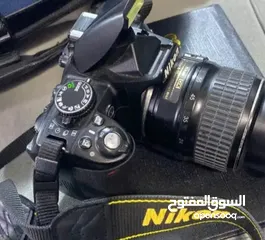  1 كاميرا نيكون 3100 d