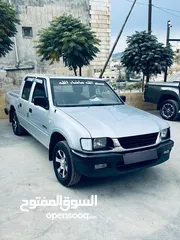  3 بيك اب ايسوزو 2003 KB / جمرك جديد /  اقساط دفعه أولى 2500