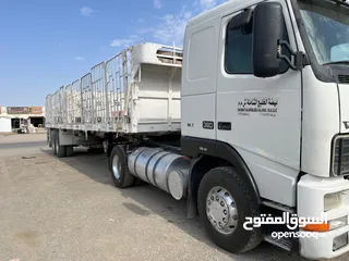  4 Volvo FH with heavy trailer