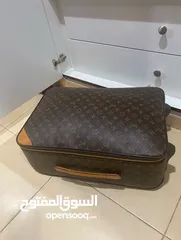  7 Louis Vuitton travelling suitcase