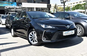  1 تويوتا كورولا هايبرد بحالة الوكالة Toyota Corolla Hybrid 2022