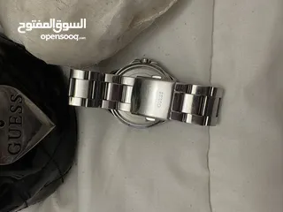  6 ساعه guess اصليه لون فضي