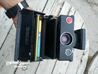  20 polarid sx70 & OLYMPUS & KODAK DISC