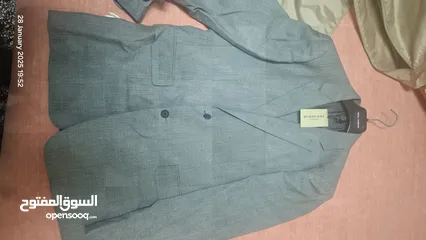  1 New unworn suit and trench coat burberry