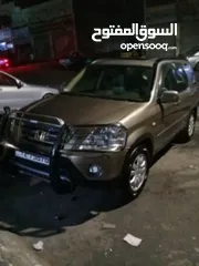  1 هوندا CR V فحص 2جيد خلفي وأمامي مضروب علا راس الجب بحاله ممتازه ولا بحاجه اي من الصيانه بس شعر وروح
