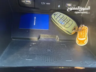  15 هونداي توسان ( هايبرد)  بنزين + كهرباء  فل الفل اضافات