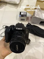  4 كاميرا كانون 850d وعدسه 50mm وستاند تصوير