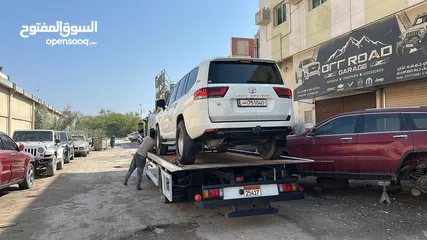  27 سطحة مدينة حمد 24  Hamad Town TOWING CAR 24  ونش  رافعة  رافعه  نقل  سطحة البحرين خدمات  سحب  سيارات