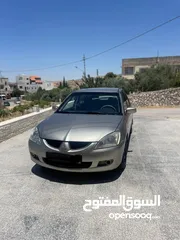  3 ميتسوبيشي لانسر موديل 2004 بحالة جيدة جدا 1600cc للبيع