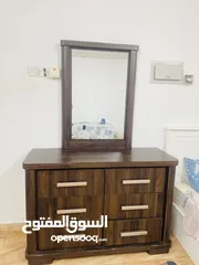  1 Wood cupboard nd dressing table with drawers