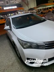  5 كورلا 2015 ابيض 1600 CC شرط الفحص مكينه جير شاصي 1550 نهائي