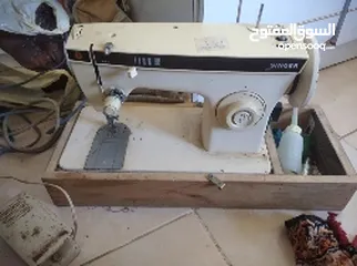  1 ماكينة خياطة. SINGER  الاصلية