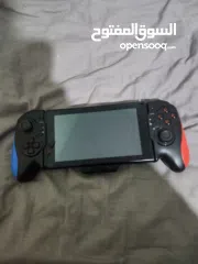  23 نينتندو سويتش مع كينترولارنينتندو سويتش مع كينترولارنينتندو سويتش مع كينترولار