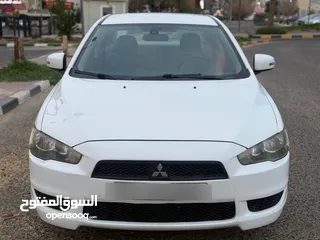  4 لانسر شارك  1600cc  بحالة ممتازة