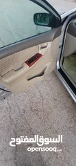  5 كورولا بيكمون  2006  ماتور 1800 اتومتك بحال الوكالة