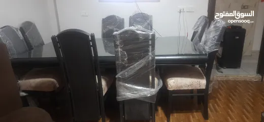  3 طاولة سفره شبه جديده 8 كراسي مع زجاجه للوجه  قابله للتفاوض لايوجد اي كسر