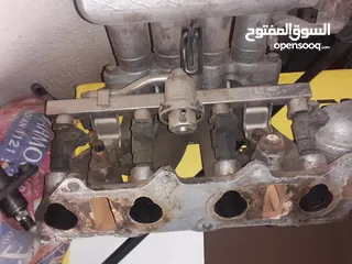  4 اربع ابواب وغطا امامي وغطا خلفي لشيري QQ 2006