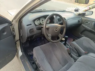  5 مازدا 323 اتماتك فتحه اصليه تحفه بمعنا الكلمه بسعر حرق 29500 ألف نقدا بدل وارد فحص نخب