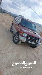  7 ميتسوبيشي باجيو1999  جير اتوماتيك 7 ركاب غرفه جلد عسليه  جير ومطور جاد مركبات