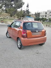  2 كيا بيكانتو موديل 2010 لون برتقالي محرك 1100قوي و اقتصادي  فحصها 3جيد قصعة مرخصة سنة تقريبا مطلوب في