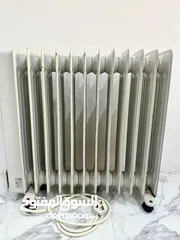  1 12 FIN Oil Heater,  in good condition