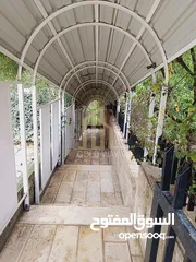  5 شقة أرضية 400م مع حديقة واسعة للإيجار في أرقى مناطق عبدون / ref 2080