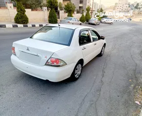  12 ميتسوبيشي لانسر GLX موديل 2012 فحص كامل اتوماتيك خصوصي الأصل وارد الخليج