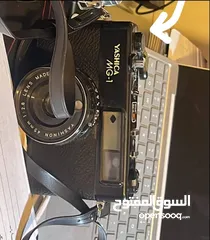  1 كاميرا فنتيج قديمة Yashica mg-1 جلد باللون الأسود معها حزامها شغالة للبيع   بدون شريط فيلم