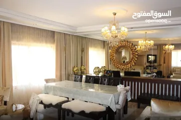  12 شقة مع روف دوبلكس للبيع في حي الصحابة - ref: 14581
