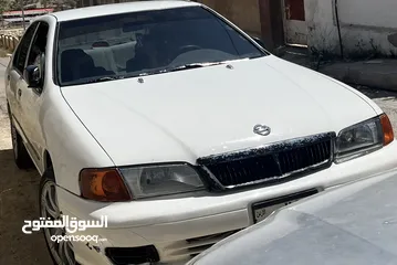  7 نيسان صني 1999 وارد ياباني ماتور 1500 قطارة بنزين ...... قابل للتفاوض والشرا ما بقصر معه ...