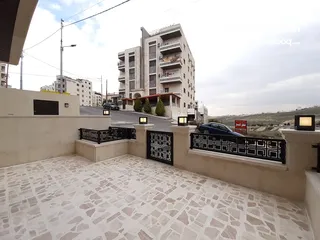  18 شقة أرضيه للبيع في اجمل مناطق حي المنصور مع ترسين و مدخل خاص