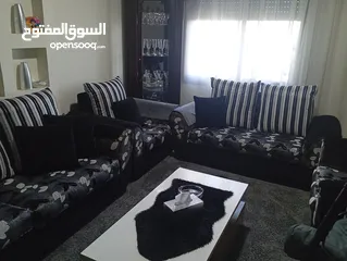 11 طقم كنب لون سكني واسود