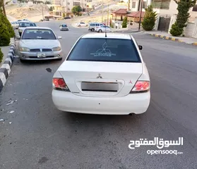  9 ميتسوبيشي لانسر GLX موديل 2012 فحص كامل وارد الخليج خصوصي الأصل