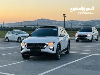  1 هونداي توسان/2024  فل الفل فتحة سقف بانوراما  2x4 ///240Hp بنزين + كهرباء  ( Haybrid) 1600cc