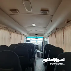  4 باص ميتسوبيشي روزا 2015 عداد  100الف تب نظافة وكاله 23 راكب +7 متحرك