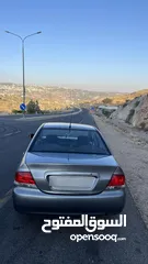  6 ميتسوبيشي لانسر موديل 2014 ماتور 1600cc اصلي بحالة جيدة جدا للبيع