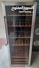  1 hoover new latest model wine bar  fridge 72 bottle dual temperature neat and clean