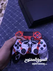  4 بلي ستيشن 4 فات مع جويستك عدد 2 وكيبل HD أصلي وأقراص عدد 2 فيفا 21 و GTA