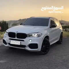  1 BMW X5 plug in with M-kit BLACK EDITION