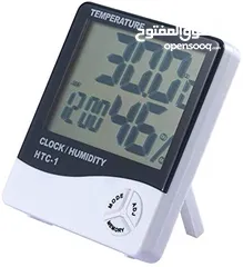  1 جهاز قياس درجة الحرارة والرطوبة مع ساعه منبه شاشة LCDيستخدم خارجي وداخلي ميزان رطوبه و حراره الرطوبه
