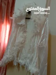  17 فساتين سهره وبدلة عرس استعمال مره واحده