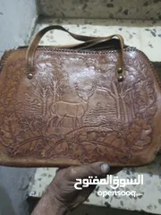  1 شنطه جلد طبيعي نادررر بحاله جيده جدا ورد أميركا